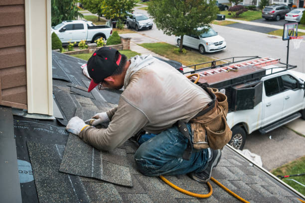 Professional Storm Damage Roof Repair technician working in Pompton Plains, NJ